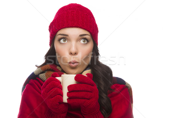 Mixed Race Woman Wearing Mittens Holds Mug Looks to Side Stock photo © feverpitch