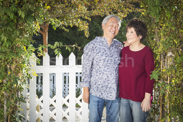 Attractive Chinese Couple Enjoying Their House Stock photo © feverpitch