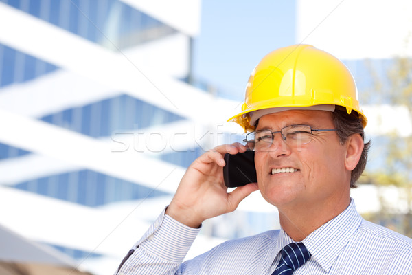 Contractor in Hardhat and Necktie Talks on His Cell Phone Stock photo © feverpitch