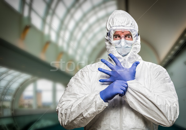 Man With Intense Expression Wearing HAZMAT Protective Clothing I Stock photo © feverpitch