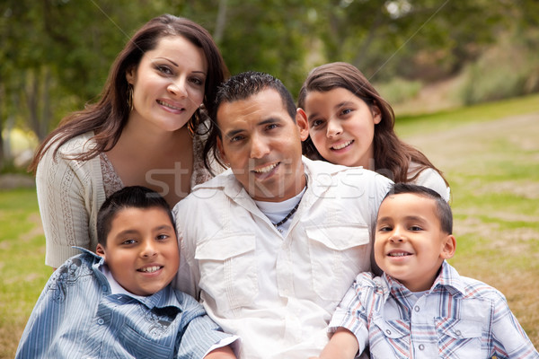 Happy Hispanic Family In the Park Stock photo © feverpitch