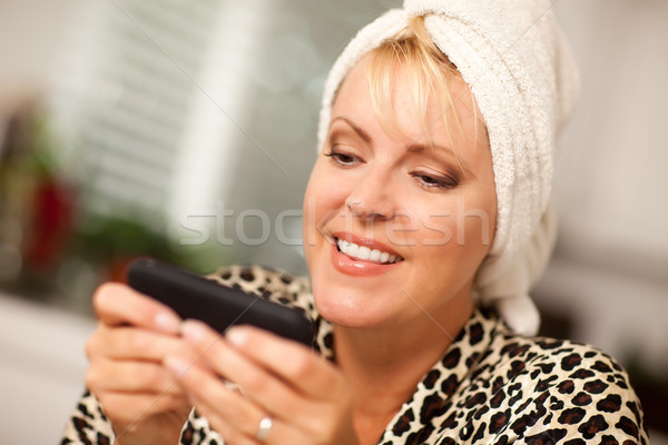 Attractive Woman Texting With Her Cell Phone Stock photo © feverpitch