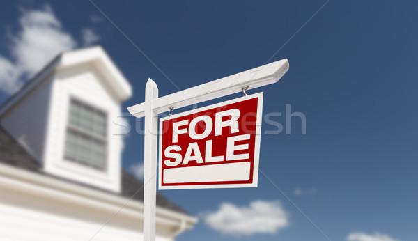 Home For Sale Real Estate Sign in Front of Beautiful New House. Stock photo © feverpitch