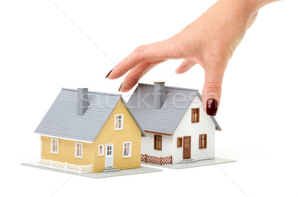 Választ otthon női kéz ház izolált Stock fotó © feverpitch