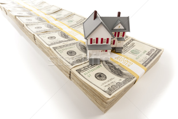 Small House on Stacks of Hundred Dollar Bills Stock photo © feverpitch