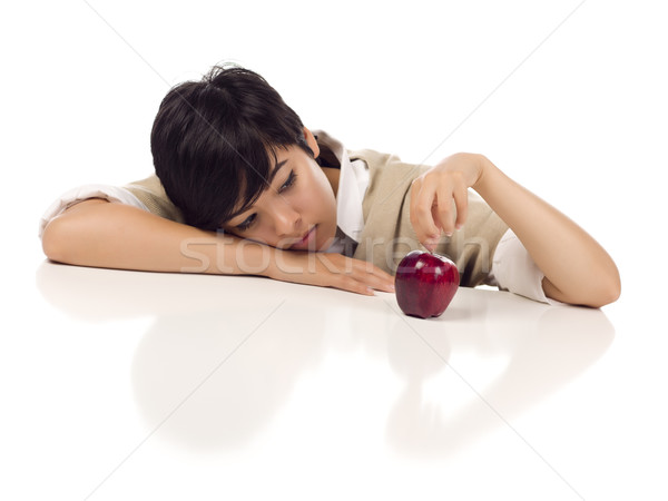 Stock photo: Melancholy Mixed Race Young Adult Female Sitting with Apple Isol