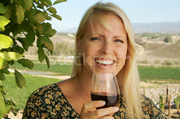 Attractive Woman Sips Wine Stock photo © feverpitch