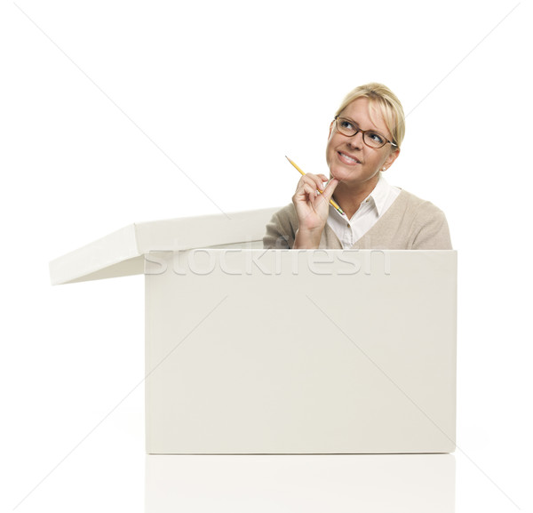 Pretty Female Popping Out and Thinking Outside The Box Stock photo © feverpitch