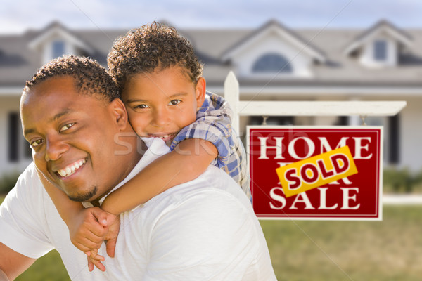 Mixed Race Father and Son In Front of Real Estate Sign and House Stock photo © feverpitch