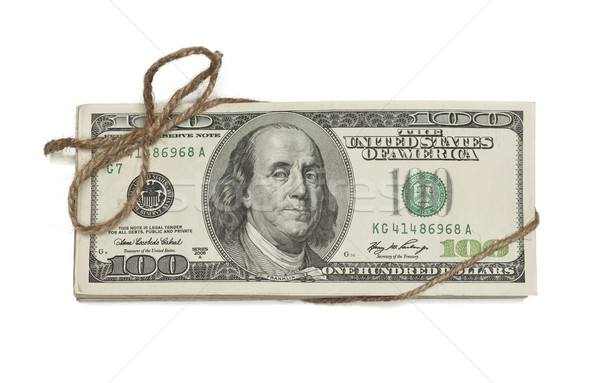 Stack of One Hundred Dollar Bills Tied in a Burlap String on Whi Stock photo © feverpitch