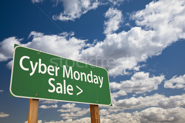 Cyber Monday Sale Green Road Sign and Clouds Stock photo © feverpitch