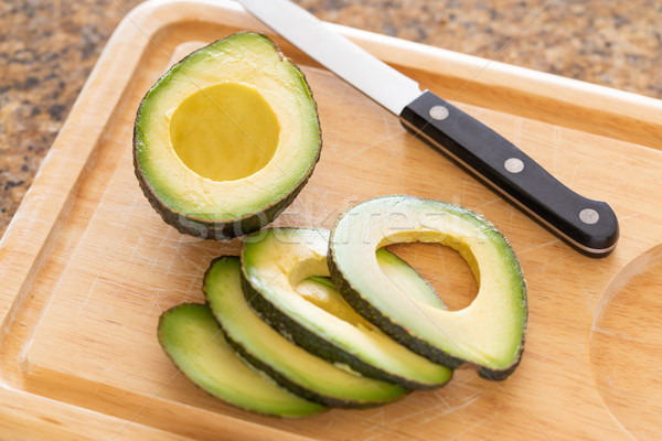 Fresh Cut Avocado on Wooden Cutting Board Stock photo © feverpitch