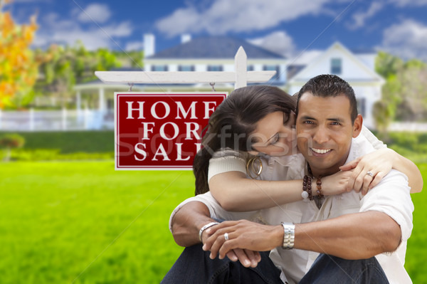 Hispanic Couple, New Home and For Sale Real Estate Sign Stock photo © feverpitch