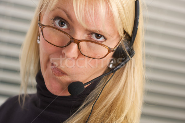 Stock photo: Attractive Businesswoman with Phone Headset