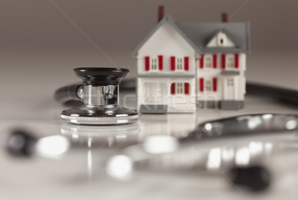Stethoscope with Small Model Home Stock photo © feverpitch