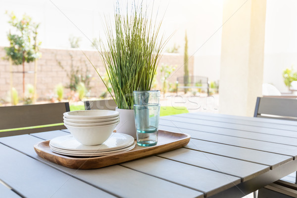Outdoor Patio Setting with Dishes and Glasses on Tray Stock photo © feverpitch