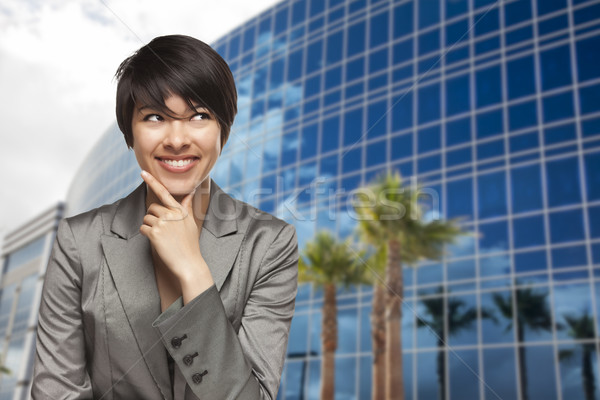 Mixed Race Young Adult in Front of Building Stock photo © feverpitch