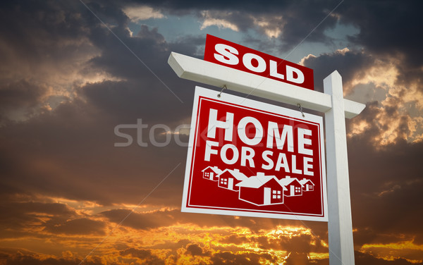 Stock photo: Red Sold Home For Sale Real Estate Sign Over Sunset Sky