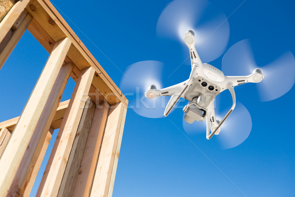 Drone Quadcopter Flying and Inspecting Construction Site Stock photo © feverpitch