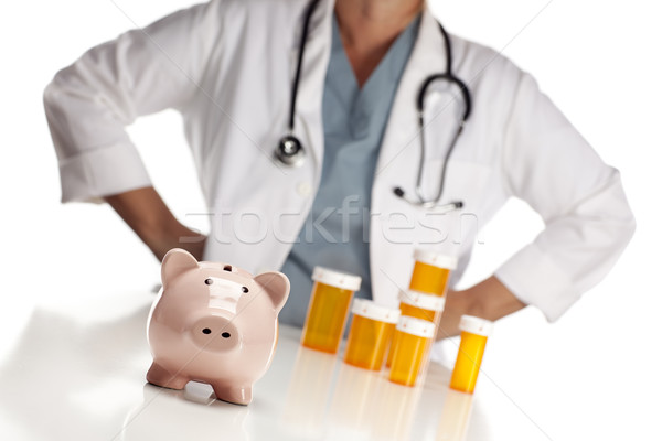 Arts permanente achter geneeskunde flessen spaarvarken Stockfoto © feverpitch