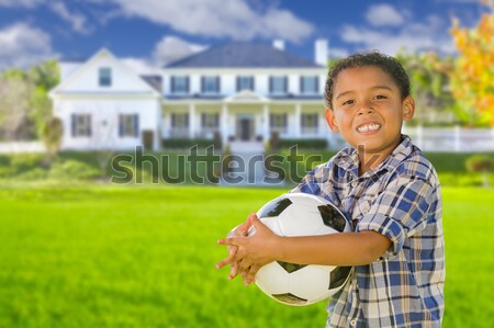 Aranyos félvér fiú játszik labda előkert Stock fotó © feverpitch