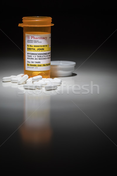 Hydrocodone Pills and Prescription Bottle with Non Proprietary L Stock photo © feverpitch
