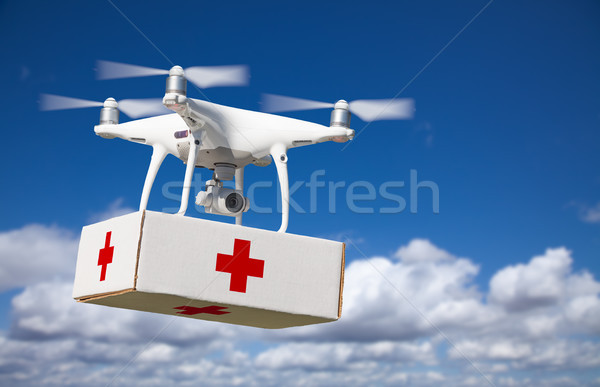 Unmanned Aircraft System (UAS) Quadcopter Drone Carrying First A Stock photo © feverpitch