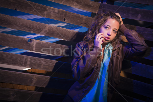 Frightened Pretty Young Woman in Dark Walkway at Night Stock photo © feverpitch