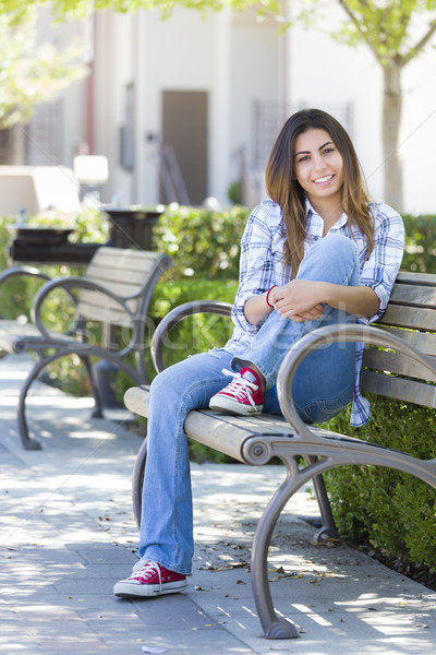 Mixed Race Female Student Portrait on School Campus Bench Stock photo © feverpitch