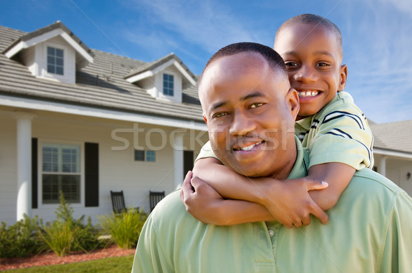 Father and Son Outside of Home Stock photo © feverpitch