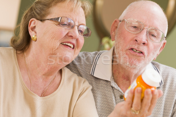 Senior Couple Reading Medicine Bottle Stock photo © feverpitch