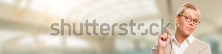 Banner of Beautiful Expressive Student or Businesswoman with Pen Stock photo © feverpitch