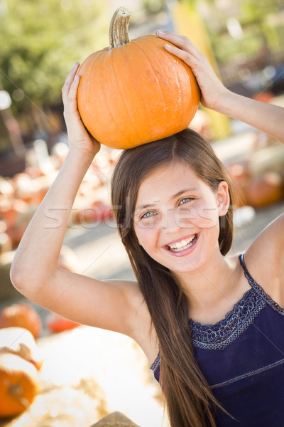 Stock photo: Preteen Girl Portrait at the Pumpkin Patch