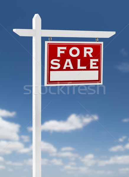 Right Facing For Sale Real Estate Sign on a Blue Sky with Clouds Stock photo © feverpitch