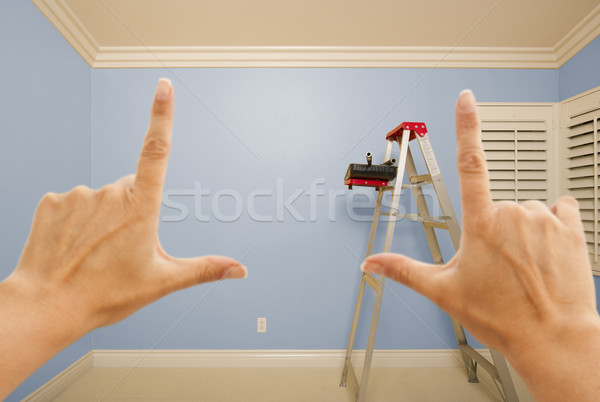 Hands Framing Blue Painted Wall Interior Stock photo © feverpitch