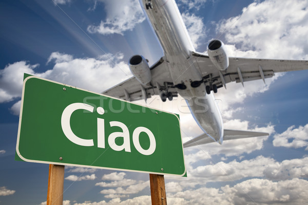 Ciao Green Road Sign and Airplane Above Stock photo © feverpitch