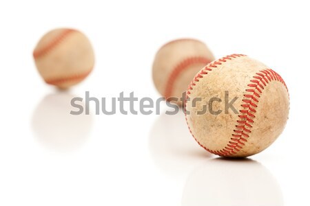 Three Baseballs Isolated on Reflective White Stock photo © feverpitch
