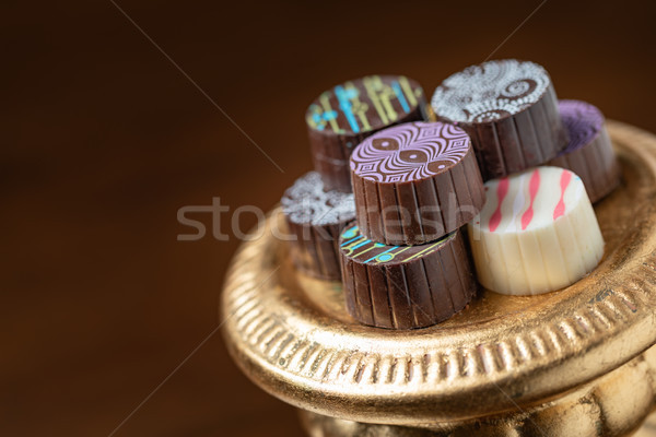 Csokoládé cukorka arany oszlop szervírozó tál Stock fotó © feverpitch