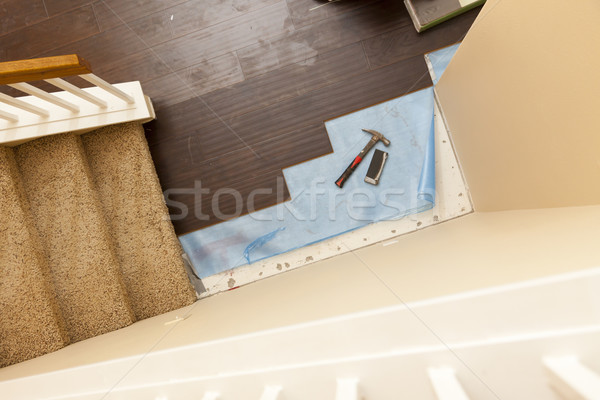 High Angle View of Hammer and Block with New Laminate Flooring Stock photo © feverpitch