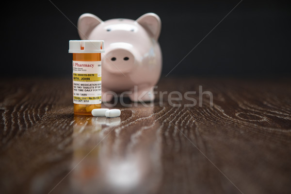 Non-Proprietary Prescription Medicine Bottle, Pills and Piggy Ba Stock photo © feverpitch