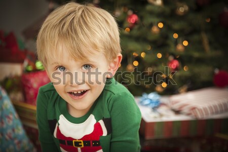 Stock photo: Young Boy Enjoying Christmas Morning Near The Tree