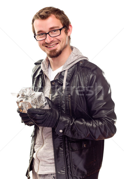 Warmly Dressed Handsome Young Man with Gift Stock photo © feverpitch