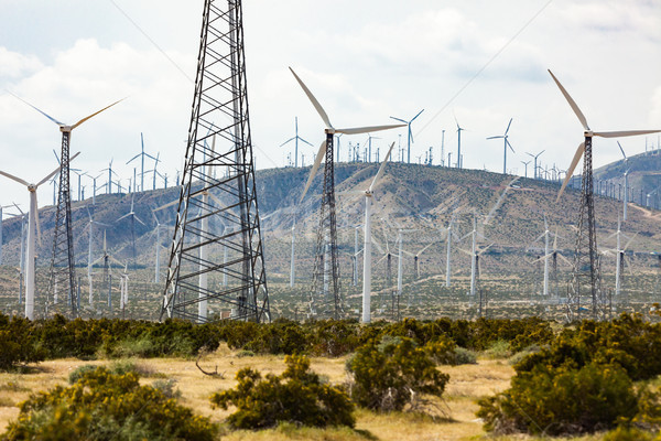 Drammatico turbina eolica farm deserto California nubi Foto d'archivio © feverpitch