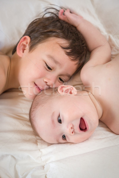 Mixed Race Chinese and Caucasian Baby Brothers Having Fun Laying Stock photo © feverpitch