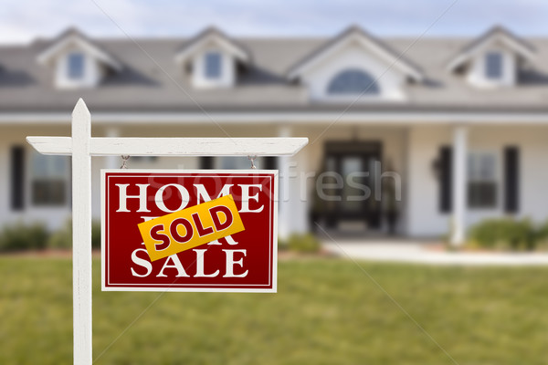 Sold Home For Sale Sign in Front of New House  Stock photo © feverpitch