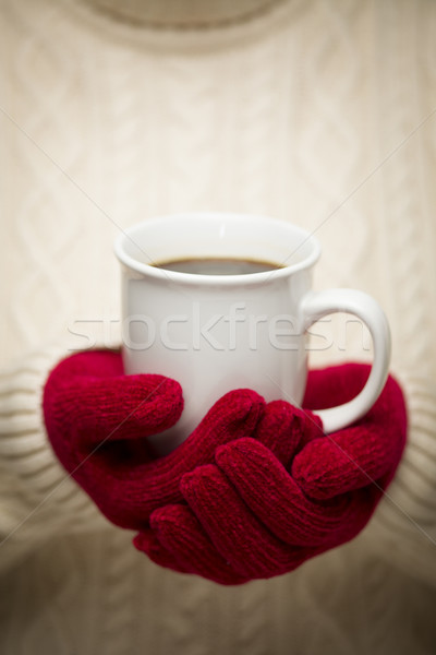 Stock photo: Woman in Sweater with Red Mittens Holding Cup of Coffee