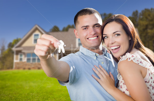 Military Couple with House Keys In Front of New Home Stock photo © feverpitch