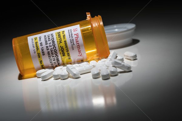 Hydrocodone Pills and Prescription Bottle with Non Proprietary L Stock photo © feverpitch