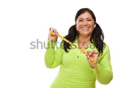 Stock photo: Hispanic Woman In Workout Clothes with Tape Measure