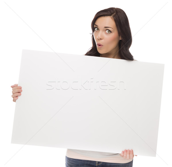 Stock photo: Wide Eyed Mixed Race Female Holding Blank Sign on White
